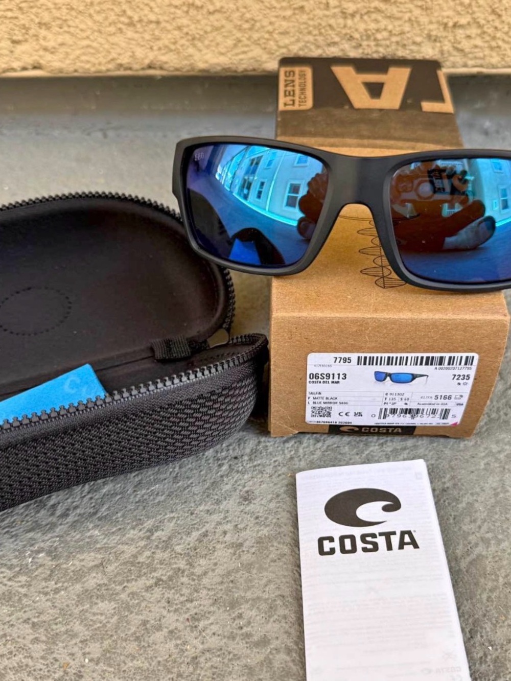 New Costa Tailfin 580 Sunglasses with Black Frame and Blue Lenses